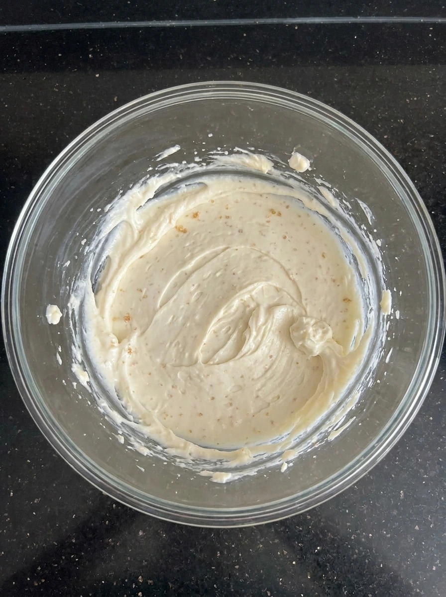 Cream cheese and sugars mixed for Pumpkin Cheesecake Dip