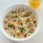 Creamy Chicken Cordon Bleu Soup with chicken ham Swiss cheese and parsley