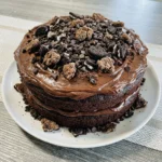 Classic Fudge & Crunch Cake with chocolate frosting and crunchy cookie topping