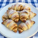 Golden Mini Pumpkin Pie Crescent Rolls filled with spiced pumpkin